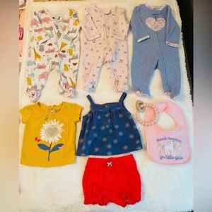 Lot of baby girl clothes, tags state 3 months or 3-6 months.